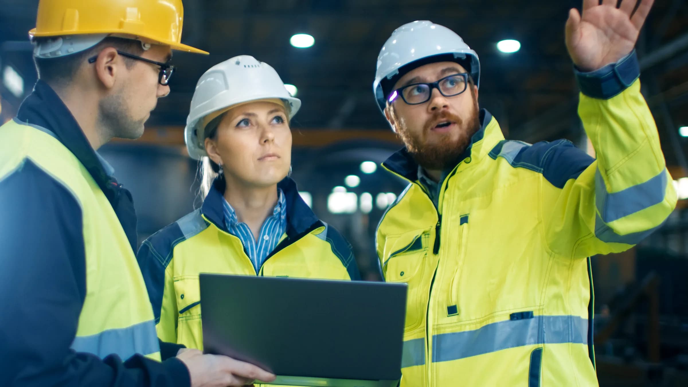 Construction professionals reviewing project details on site