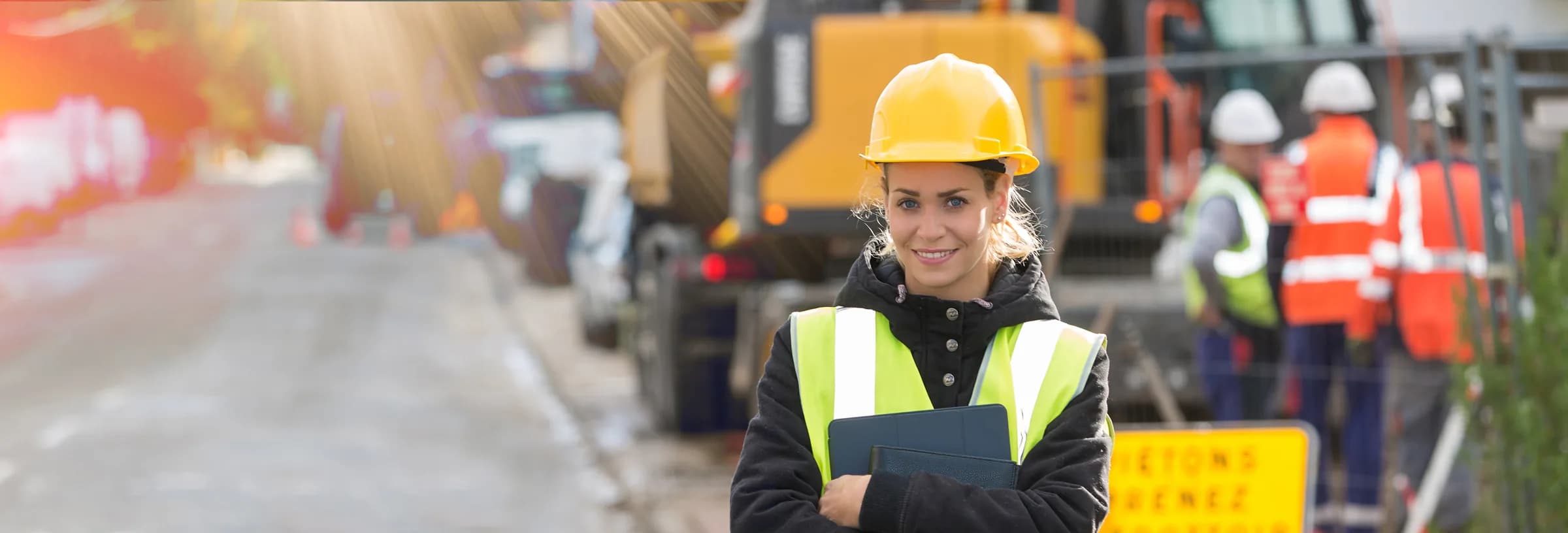 Confident construction professional on a project site